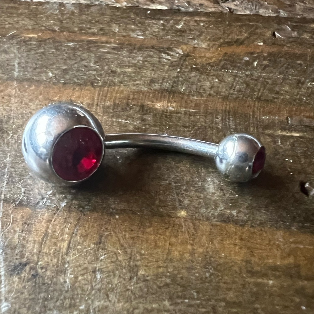 Red gemmed belly ring